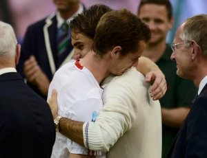 Roger Federer consoles Andy Murray after Murray lost to him in the Wimbledon final. Murray has said "its a pity he can't play like (Roger)"